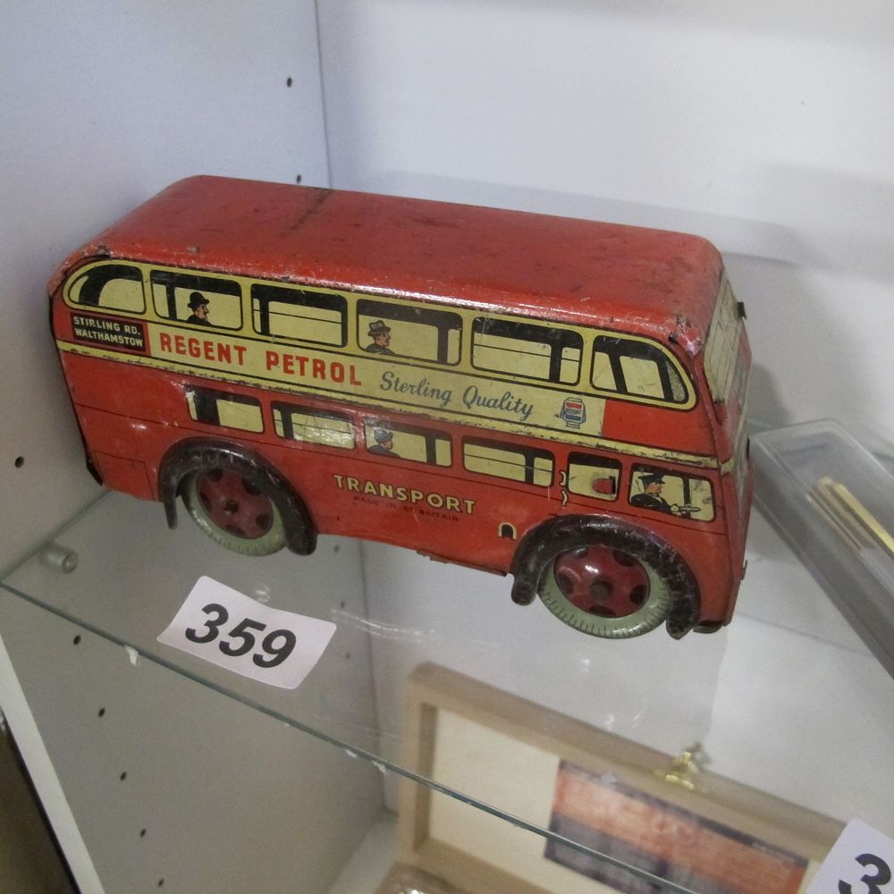 Lot 359: tin plate wind up London bus