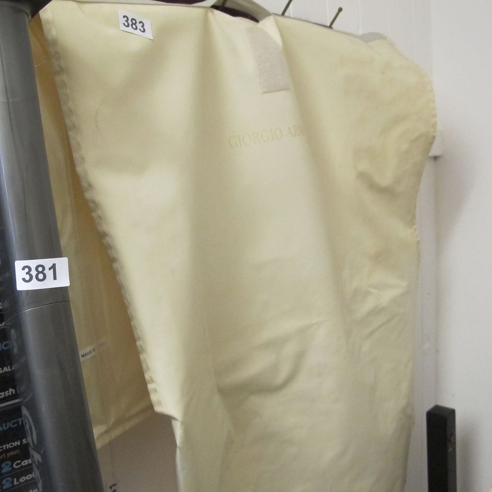 Lot 383: Giorgio Armani suit bag