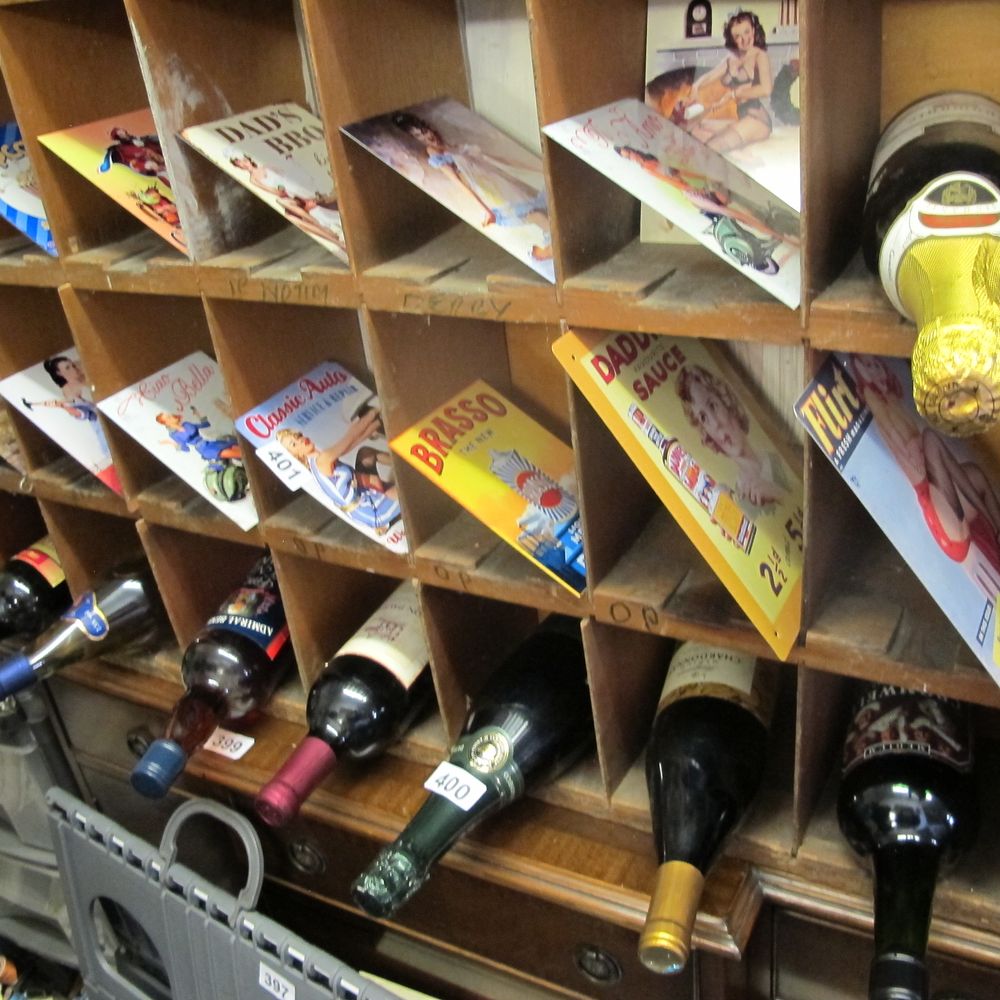 Lot 401: large collection of repro metal advertising signs