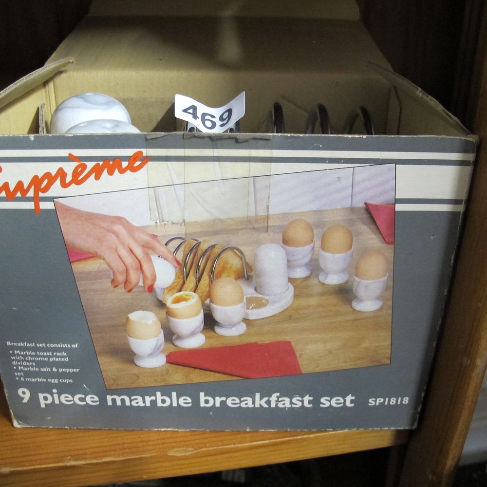 Lot 469: marble breakfast set