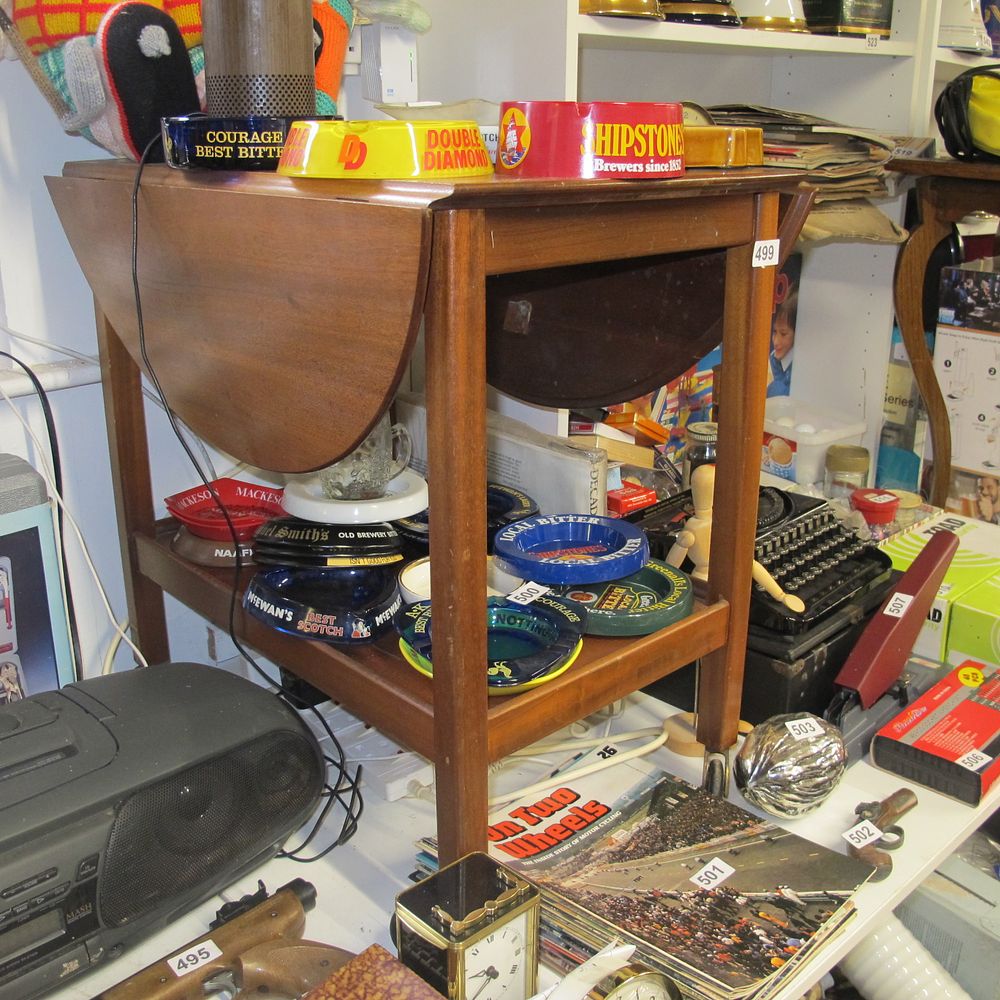 Lot 499: wooden tea trolley 