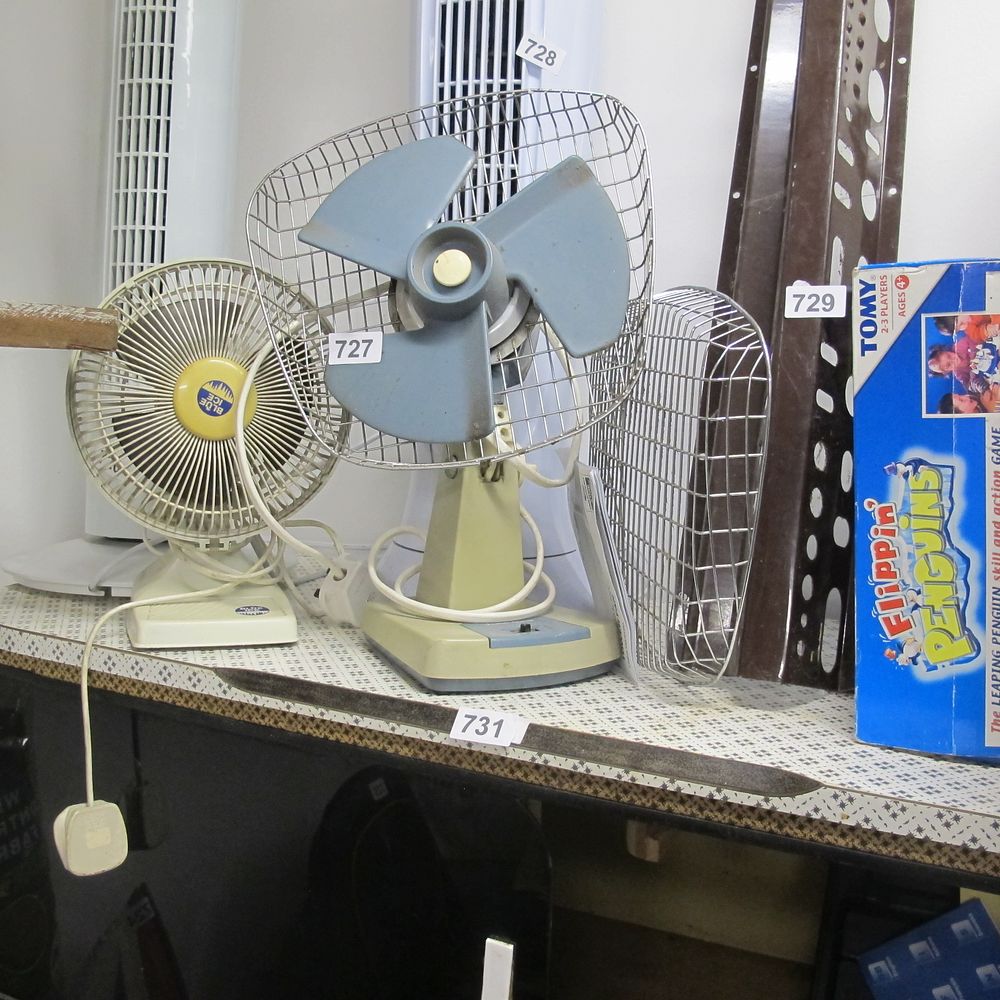 Lot 727: pair of vintage fans