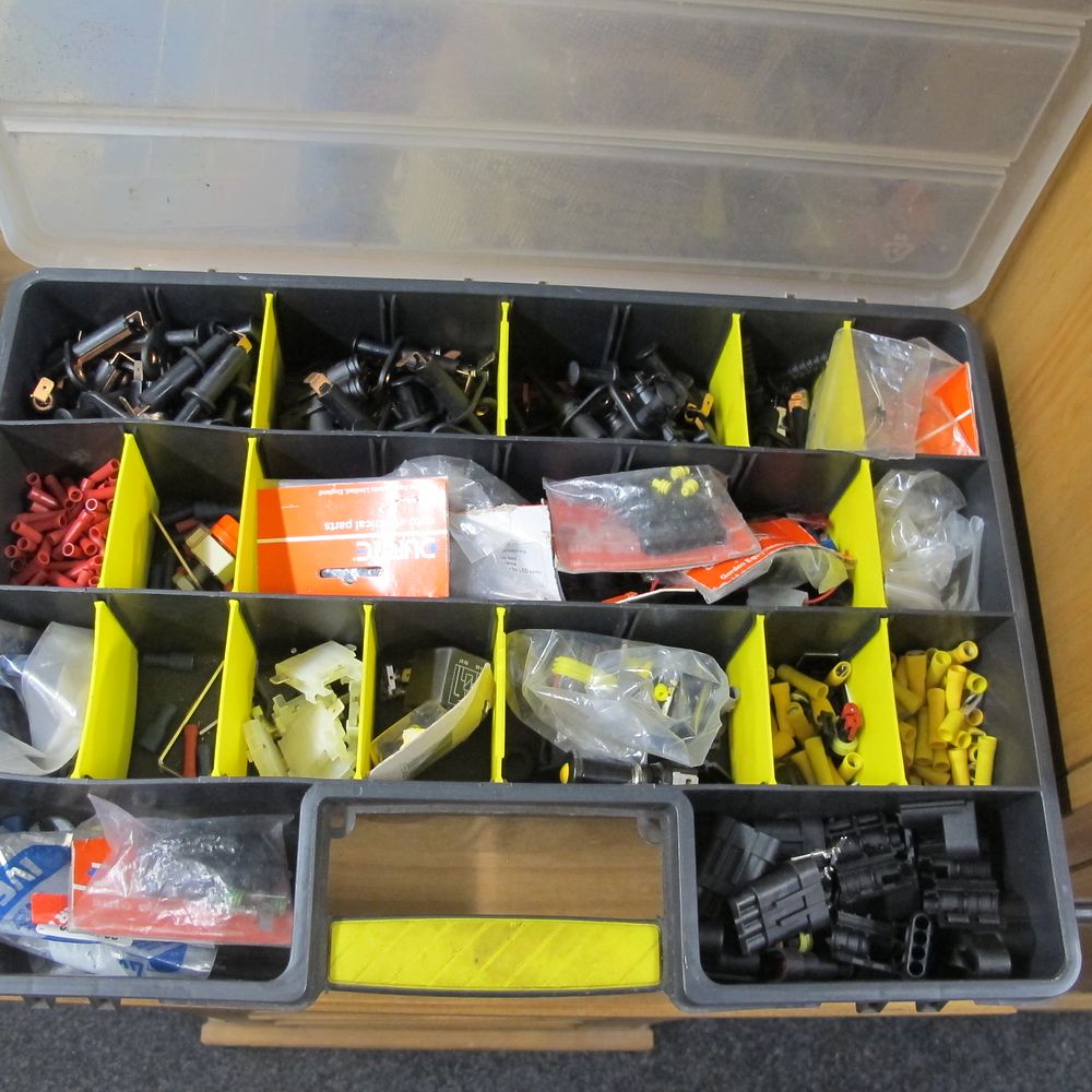 Lot 774: box of elkectrical fittings belonged to a car...