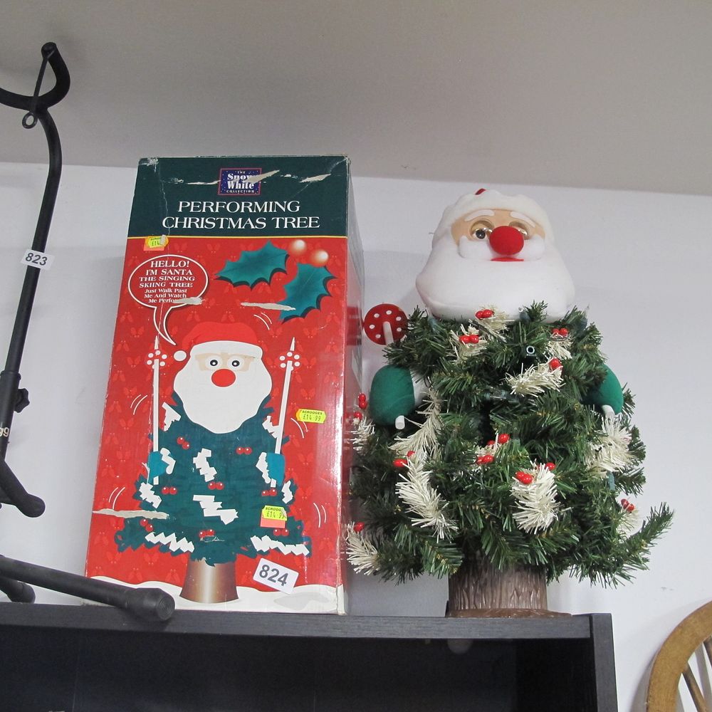 Lot 824: boxed dancing father xmas 