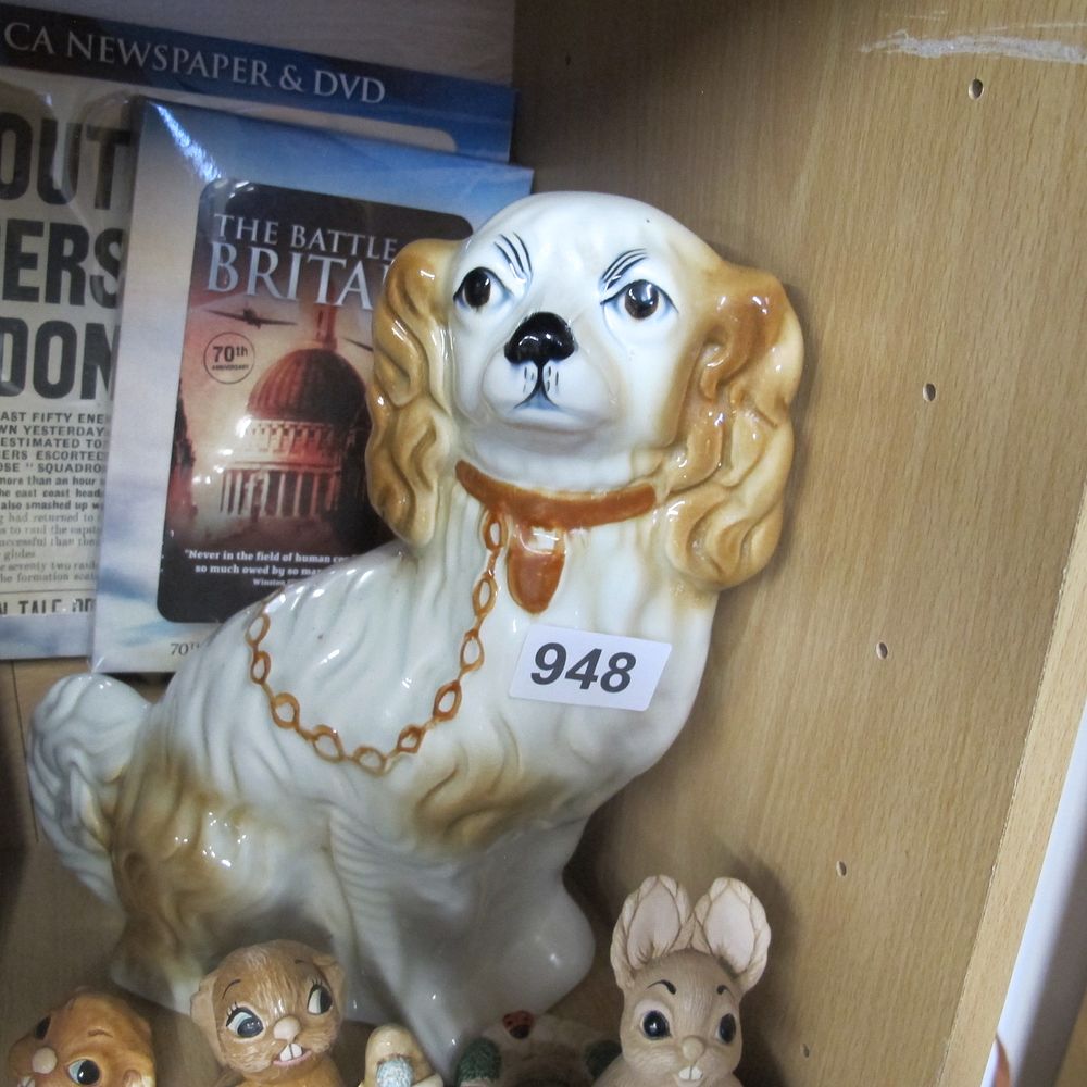 Lot 948: antique Staffordshire dog
