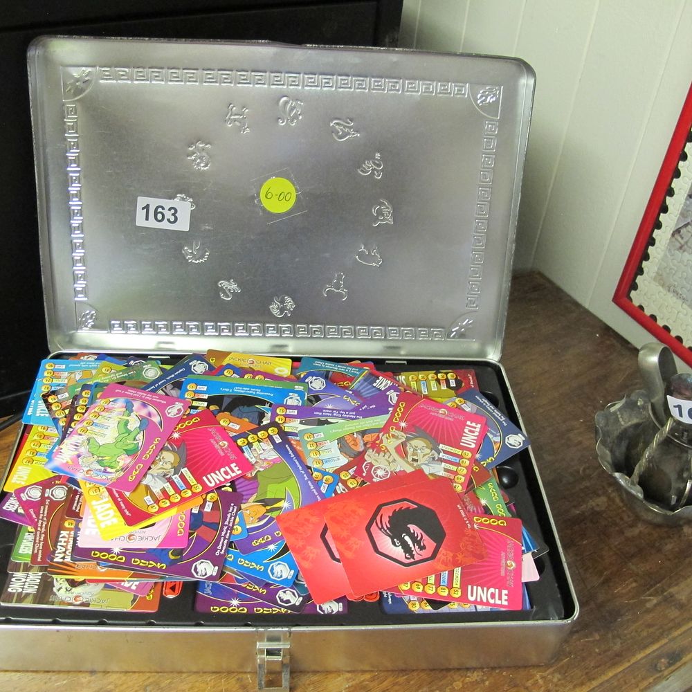 Lot 163: Tin of Jackie Chan cards