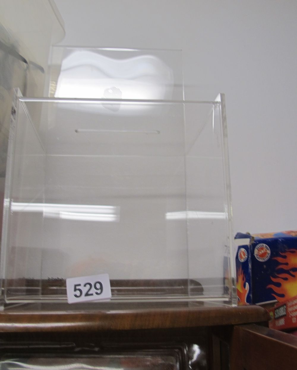 Lot 529: clear plastic box