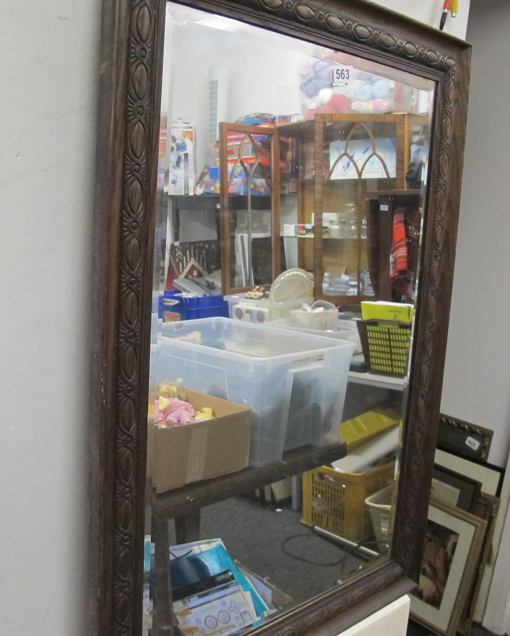 Lot 563: decorative wood framed mirror