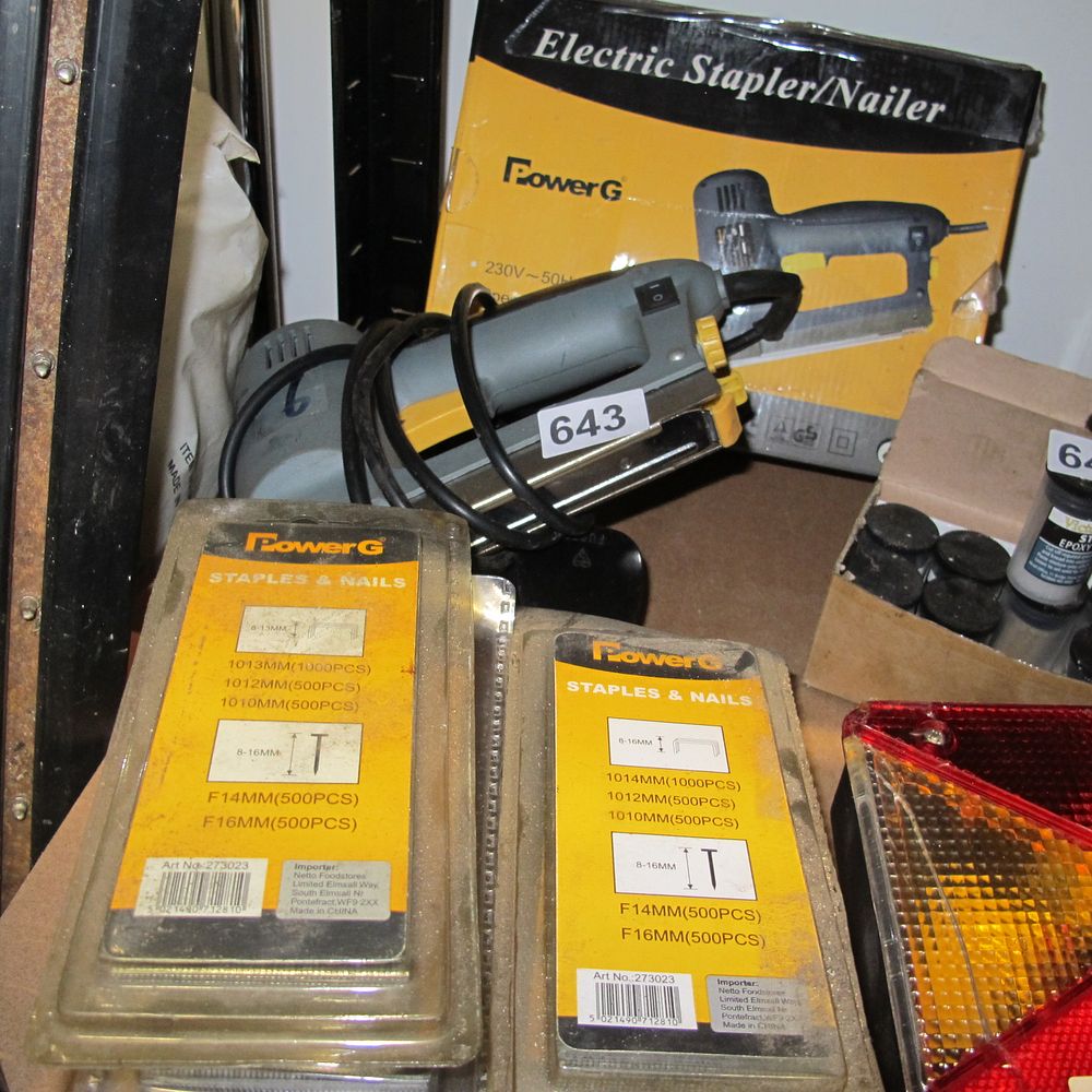 Lot 643: electric staple gun and 7 packs of staples