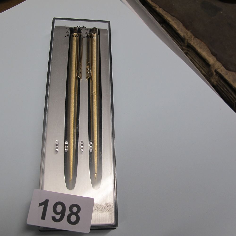 Lot 198: A pair of Papermate pens for recording your...