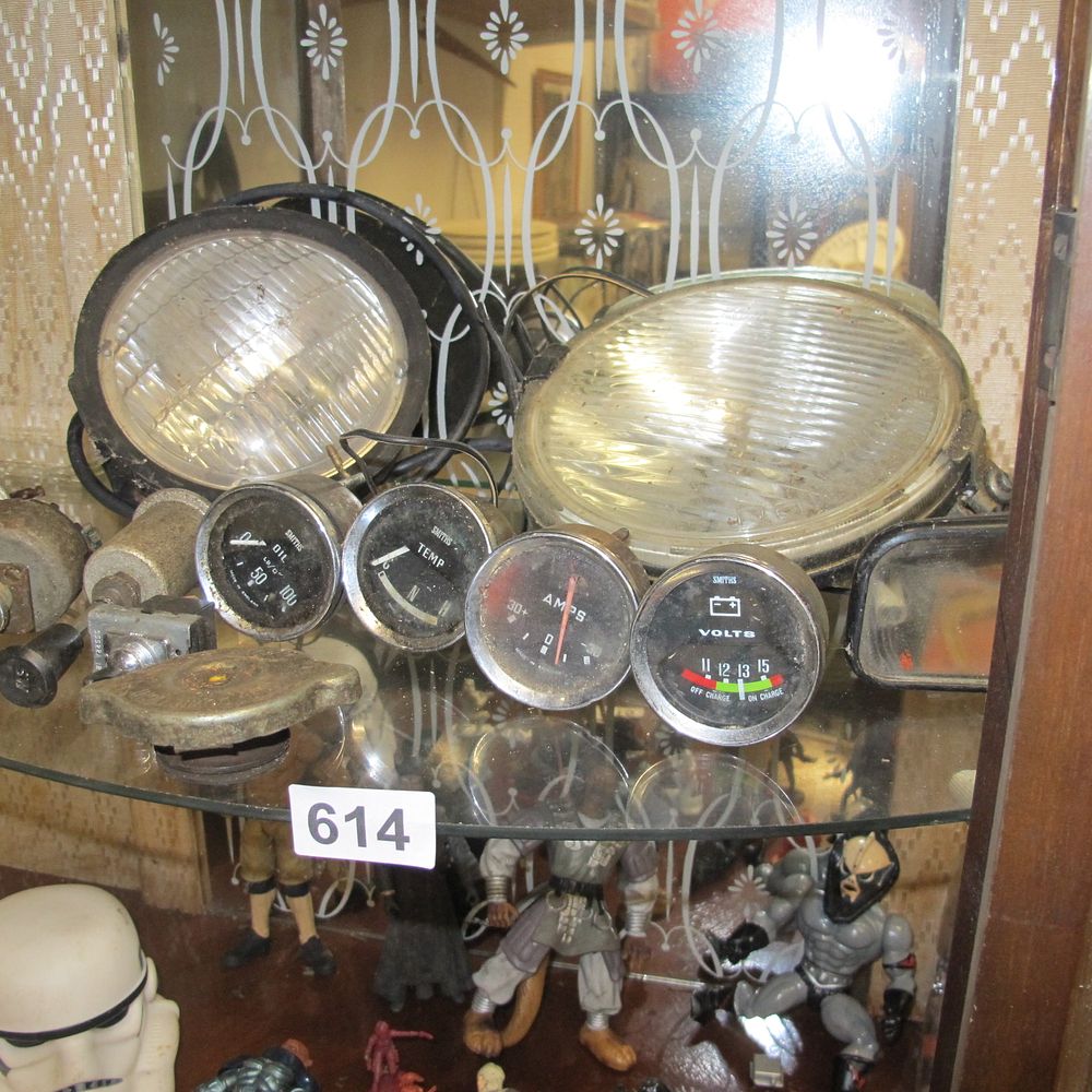 Lot 614: Vintage car gauges and lights