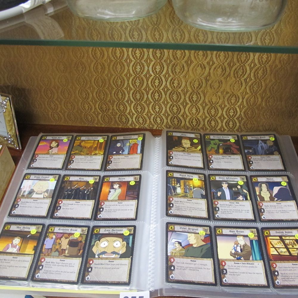 Lot 655: A binder of trading/collectors cards to include Full...