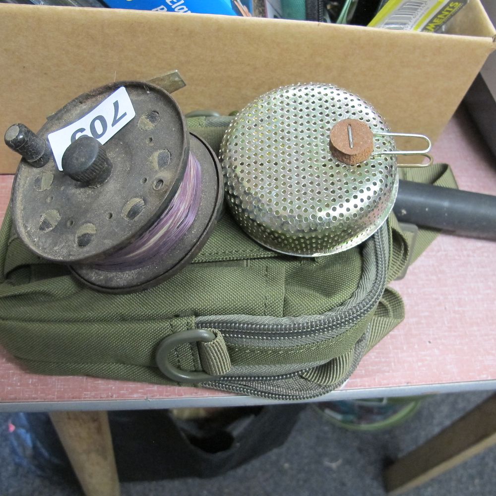 Lot 709: vintage reel and case plus bait dropper