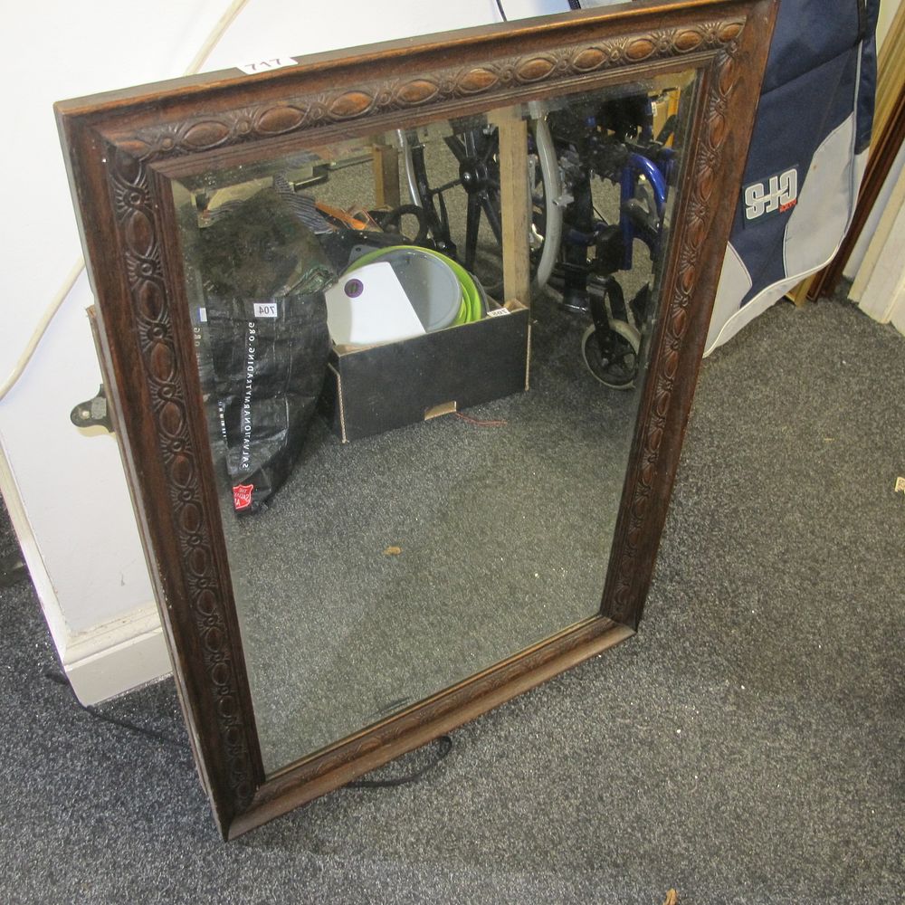 Lot 717: Ornate wood framed mirror