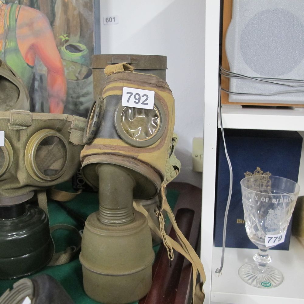 Lot 792: French WW2 Gas mask with metal storage tin