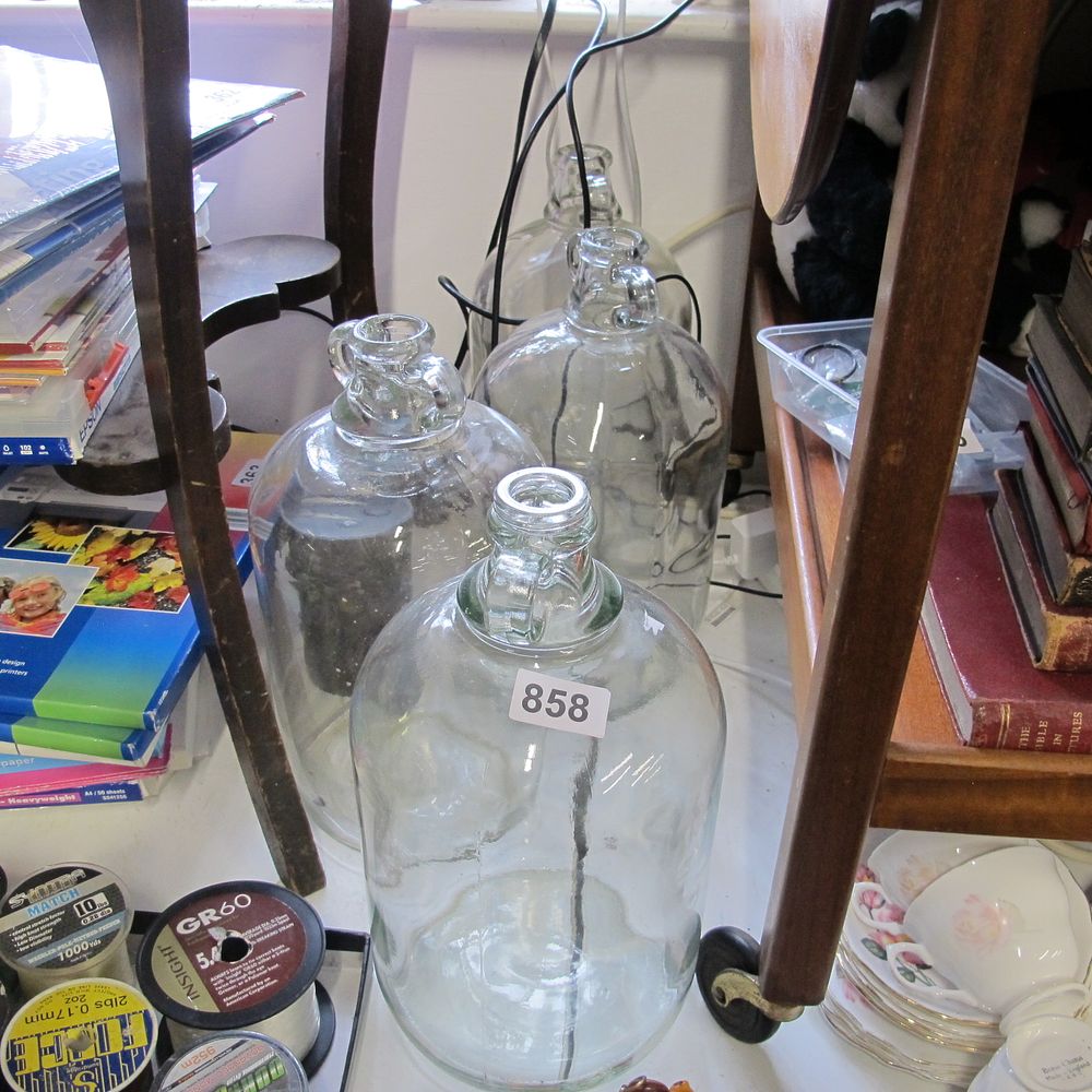 Lot 858: A quantity of demijohns