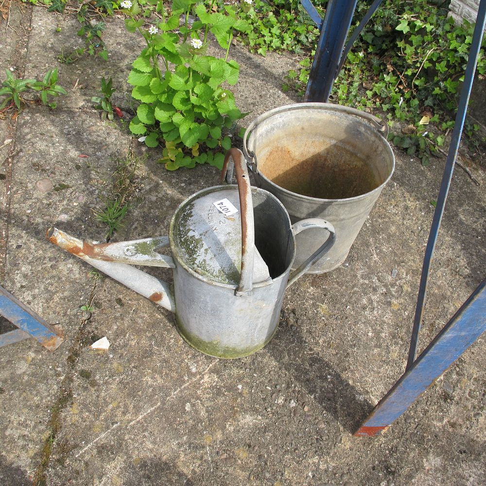 Lot 1074: galvanised watering can and bucket