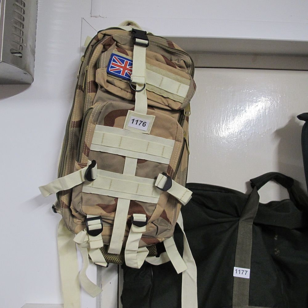 Lot 1176: camouflaged fishing bait bag / backpack