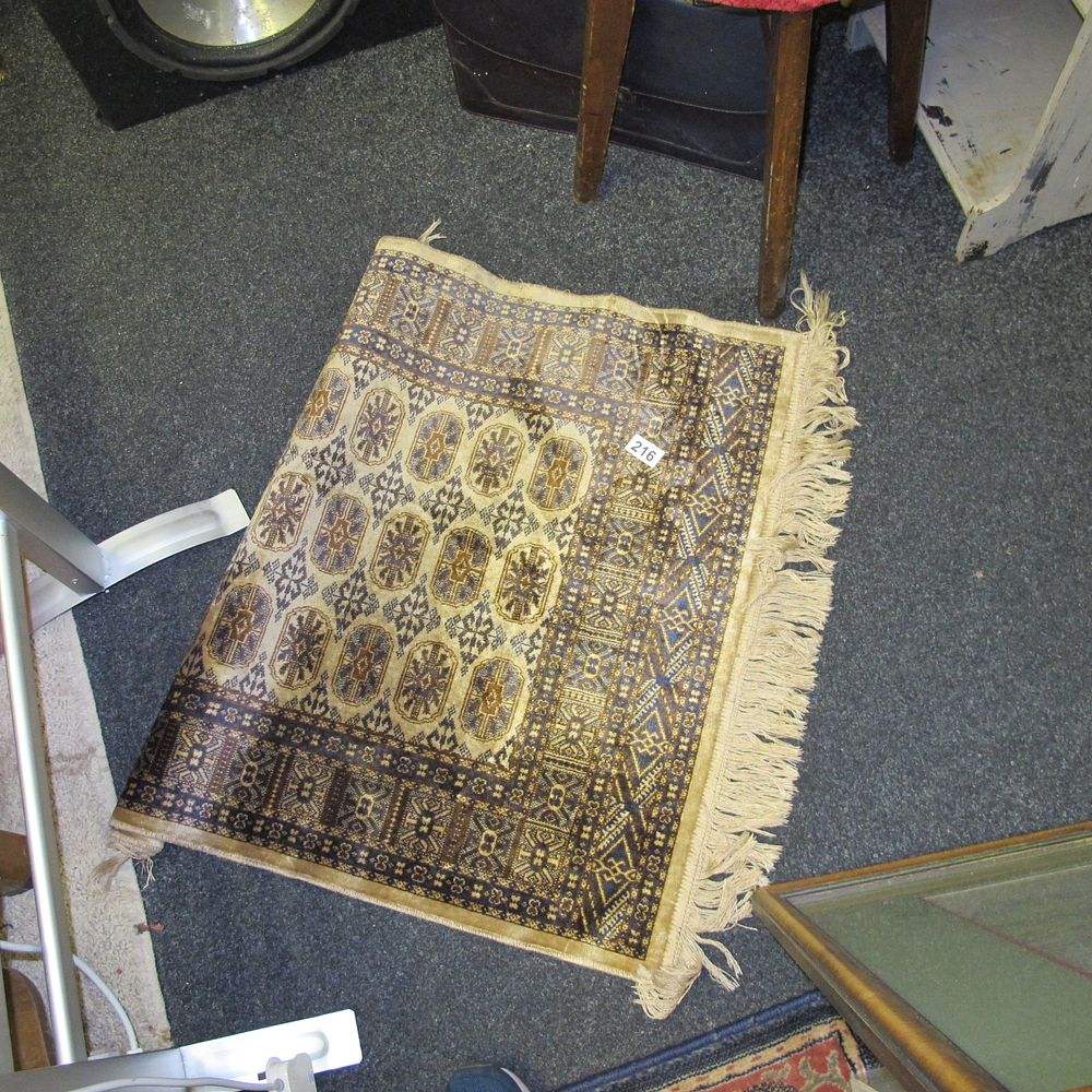 Lot 216: Beige Geometric Patterned prayer Rug with Floral Motifs