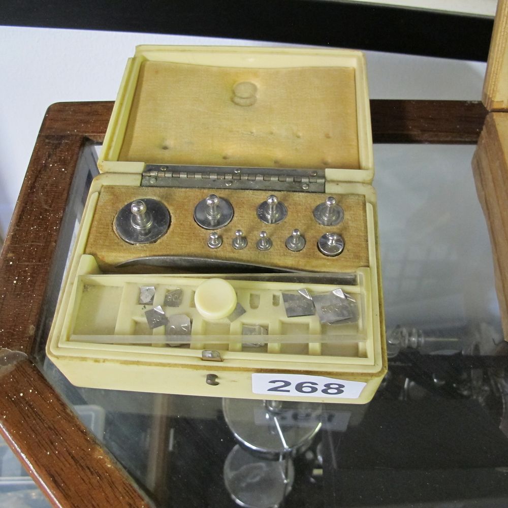Lot 268: Cased Set of Silver-Colored Calibration Weights
