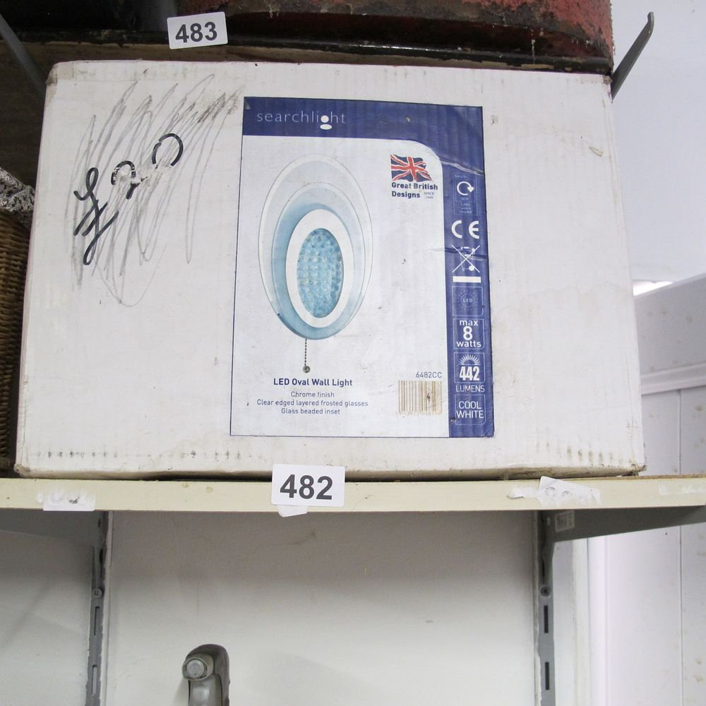 Lot 482: New In Box Searchlight LED Oval Wall Light...
