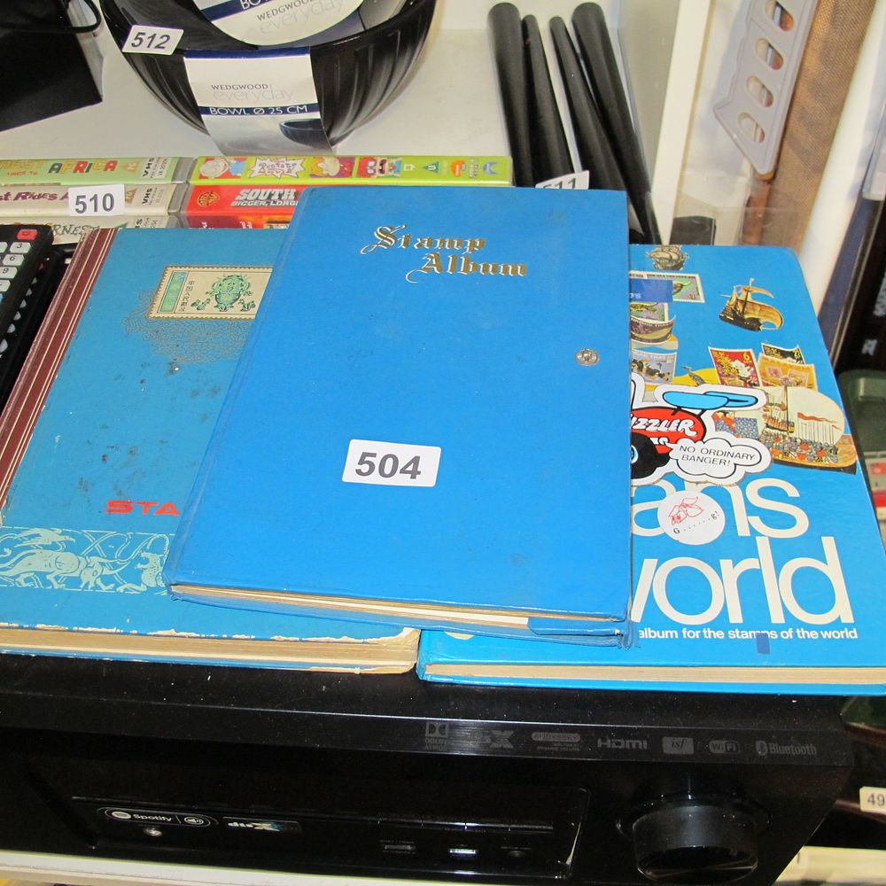 Lot 504: A Collection of Three Vintage Stamp Albums