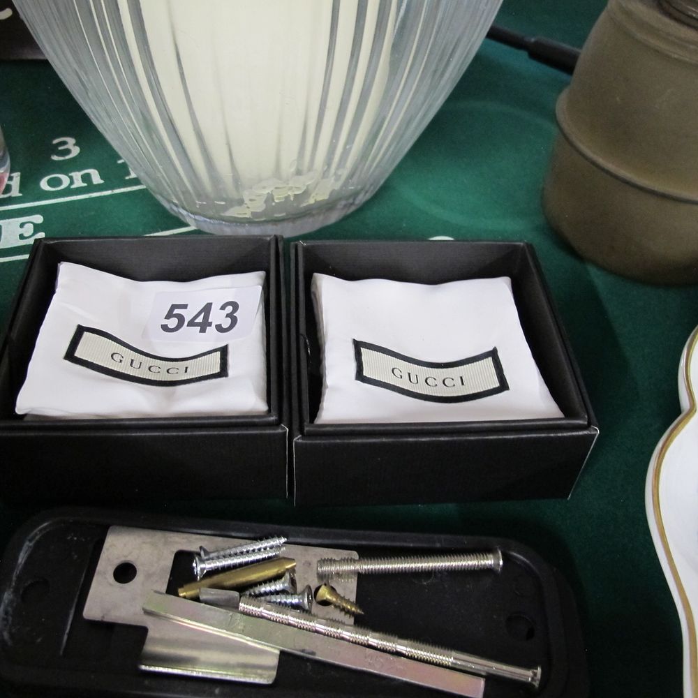 Lot 543: Pair of Gucci Scented Sachets with Hardware