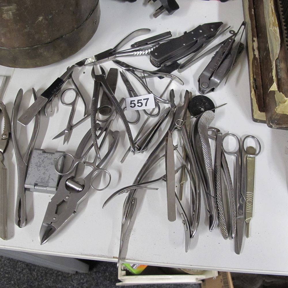 Lot 557: Collection of Metal Surgical & Dental Instruments