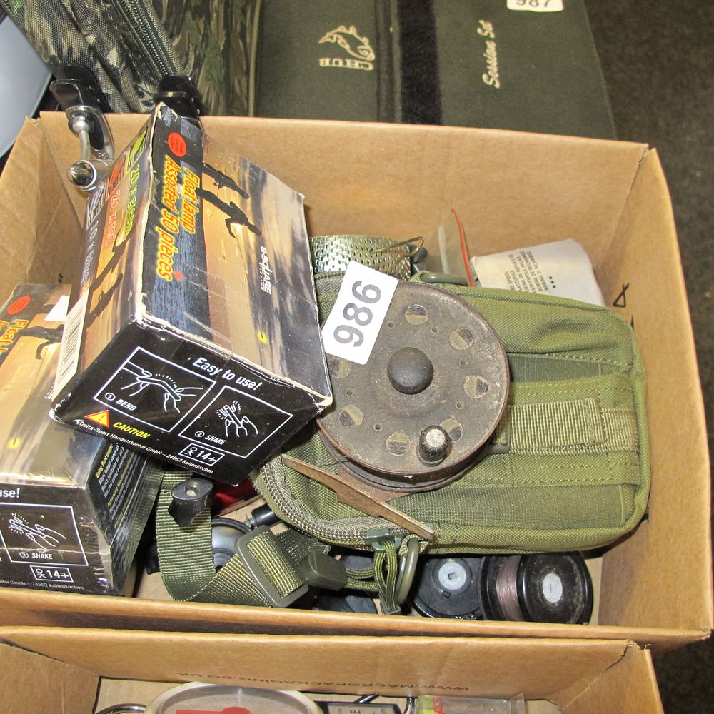Lot 986: Fishing Gear Collection with Float Lamps and Reel