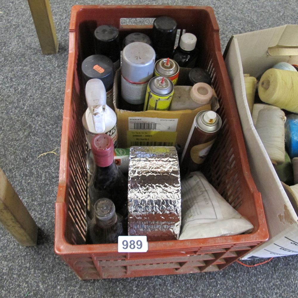 Lot 989: Plastic Crate with Aerosol Cans, Bottles, and Stanley...