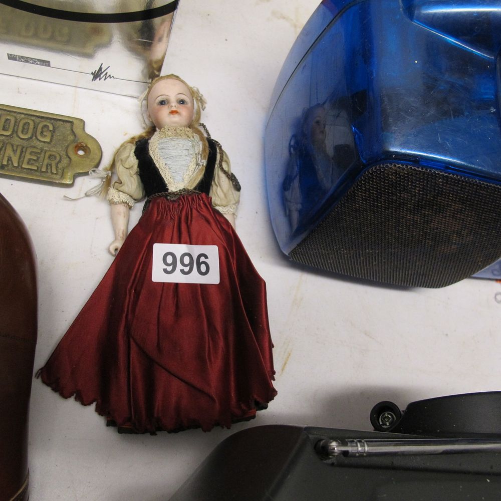 Lot 996: Porcelain Doll with Pigtails and Velvet Vest