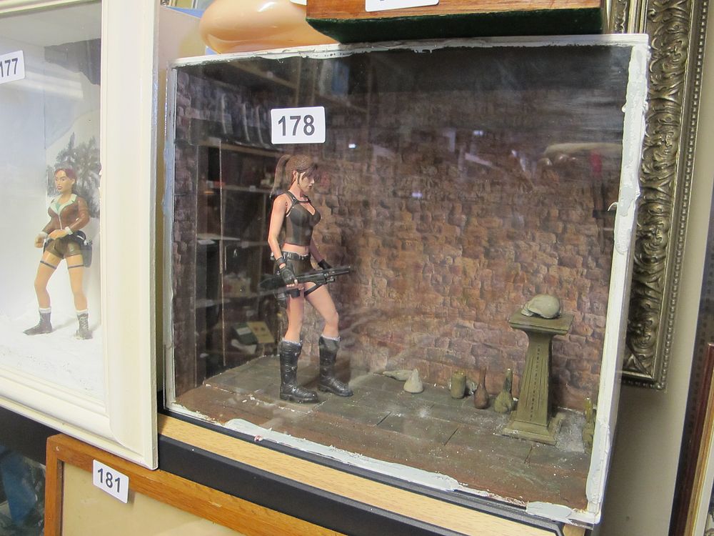 Lot 178: A Modern Diorama Featuring a Lara Croft-Style Action...