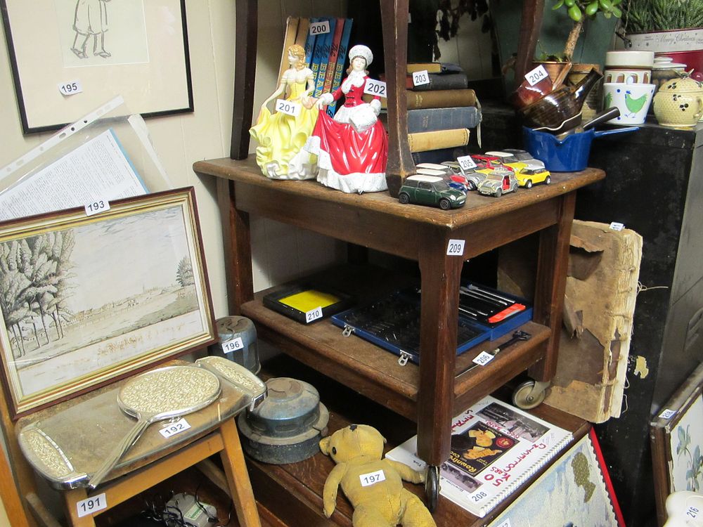 Lot 209: a solid wood antique butlers table