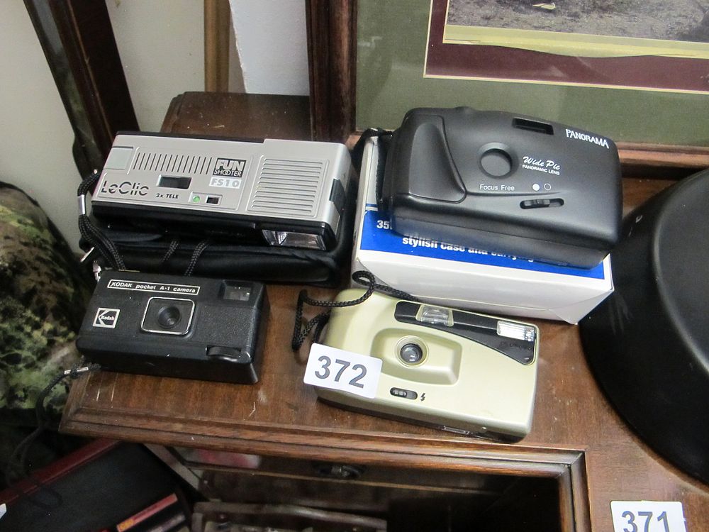 Lot 372: A Group of Late 20th Century Compact Film...