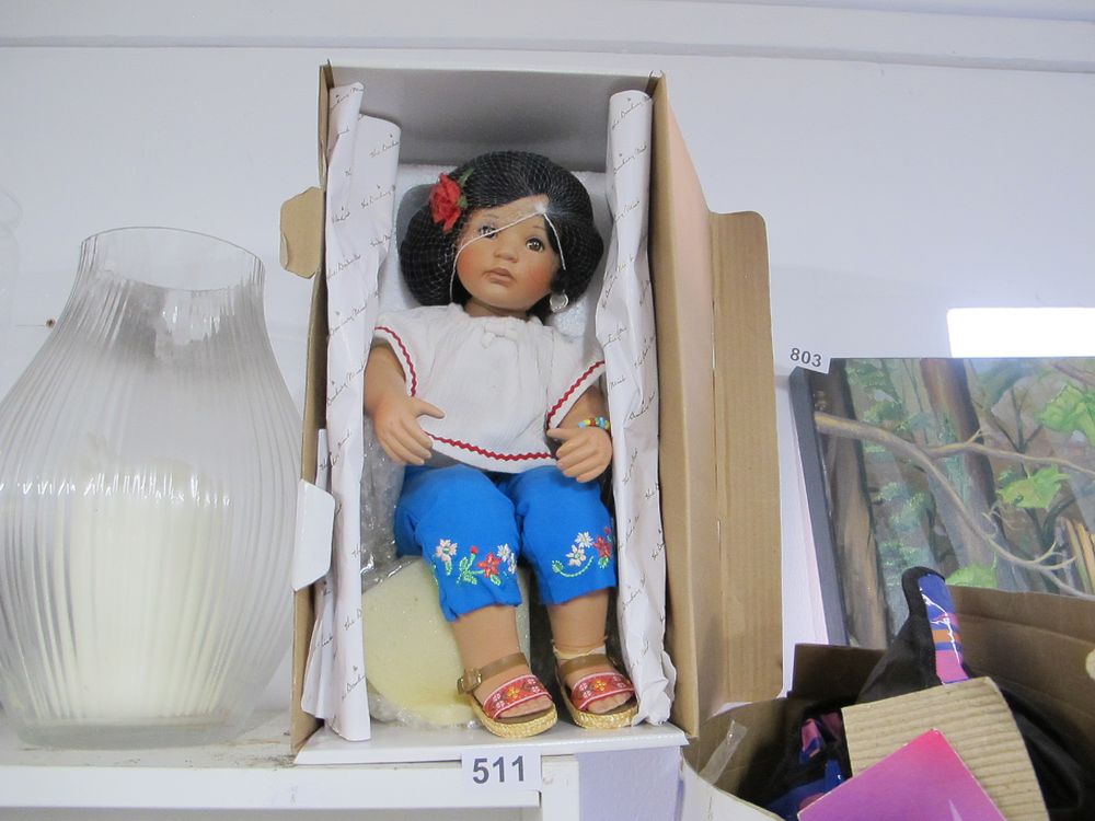 Lot 511: A Late 20th/Early 21st Century Collectible Doll by...