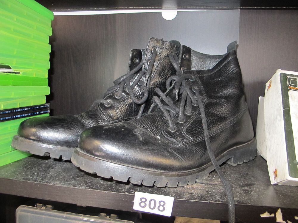 Lot 808: A Pair of Black Leather Utility Boots