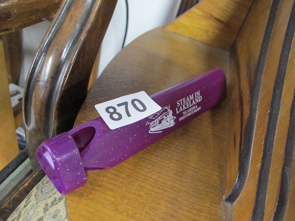 Lot 870: A Modern Plastic Souvenir Whistle for the Lakeside...