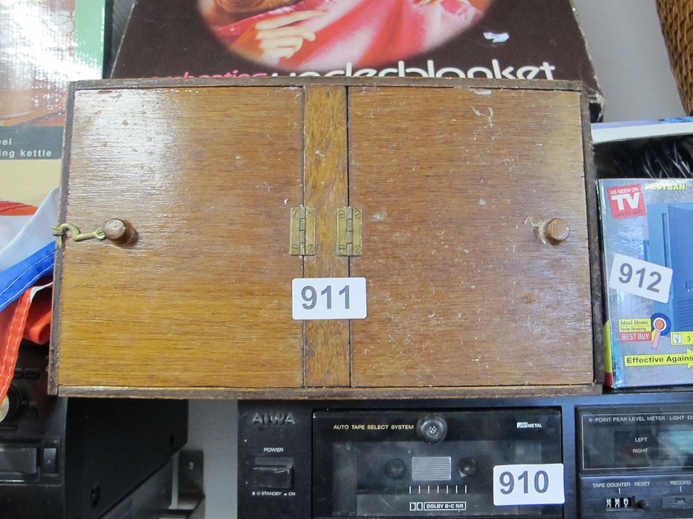 Lot 911: A Compact Wooden Cabinet