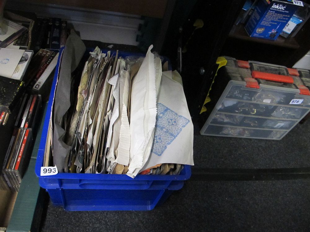 Lot 993: A Blue Plastic Storage Bin with Assorted Paper...