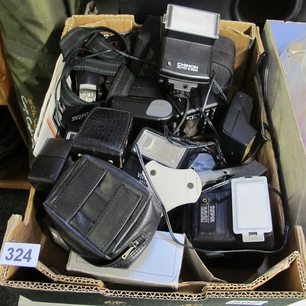 Lot 324: Lot of Vintage Photographic Flash Units and Accessories,...