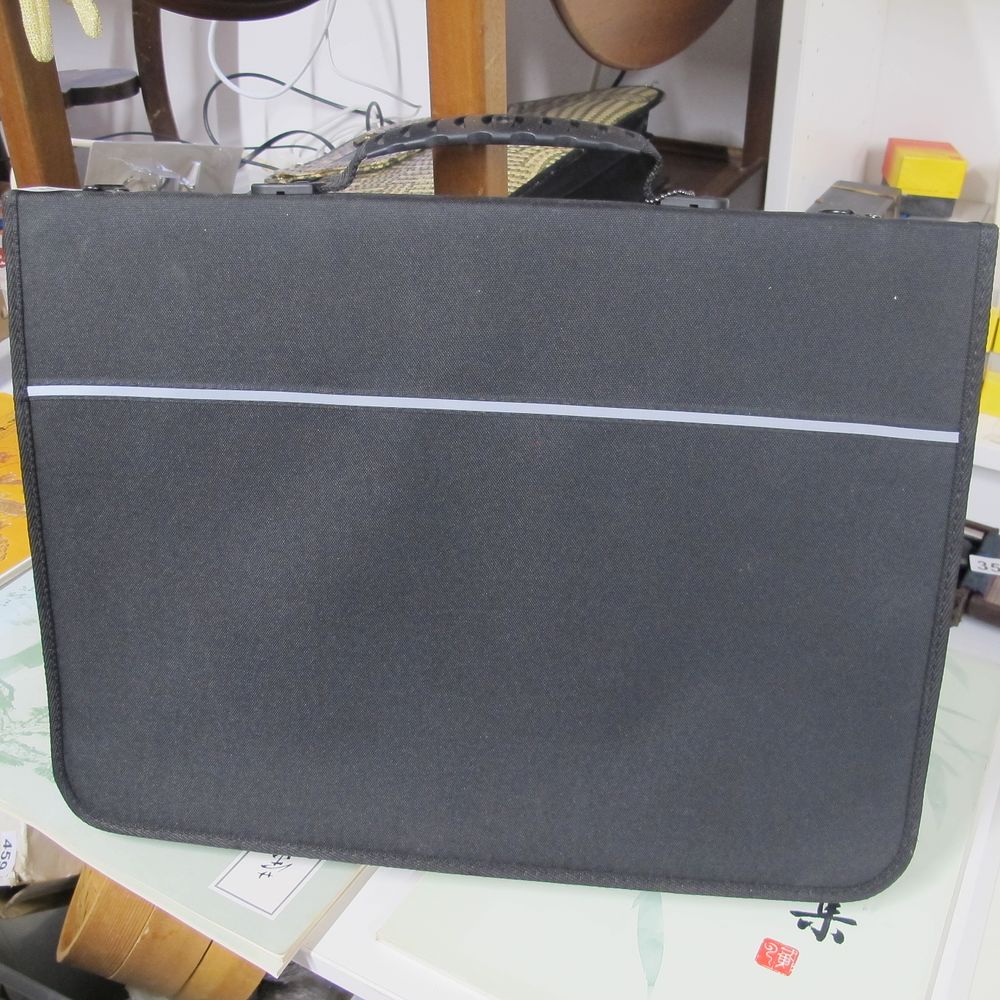 Lot 351: A Dark Grey Textile Art Portfolio Case with...