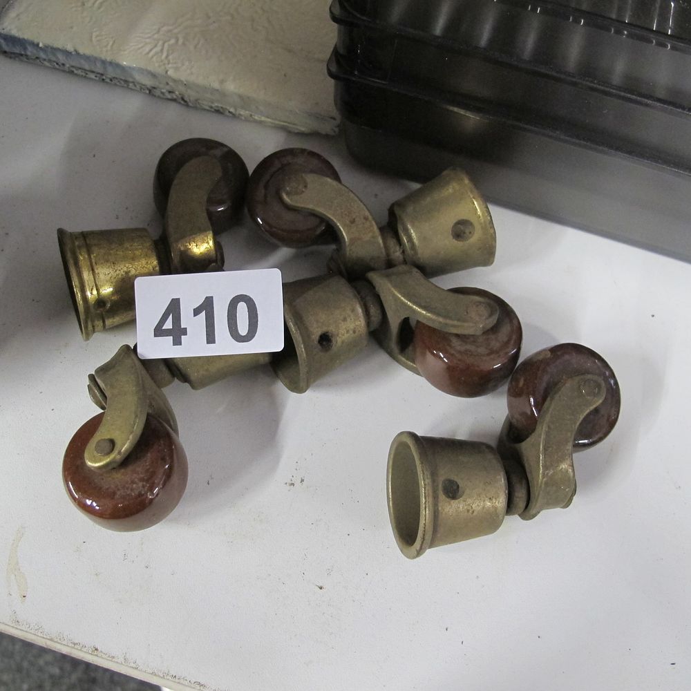 Lot 410: Six Antique Brass and Ceramic Furniture Casters