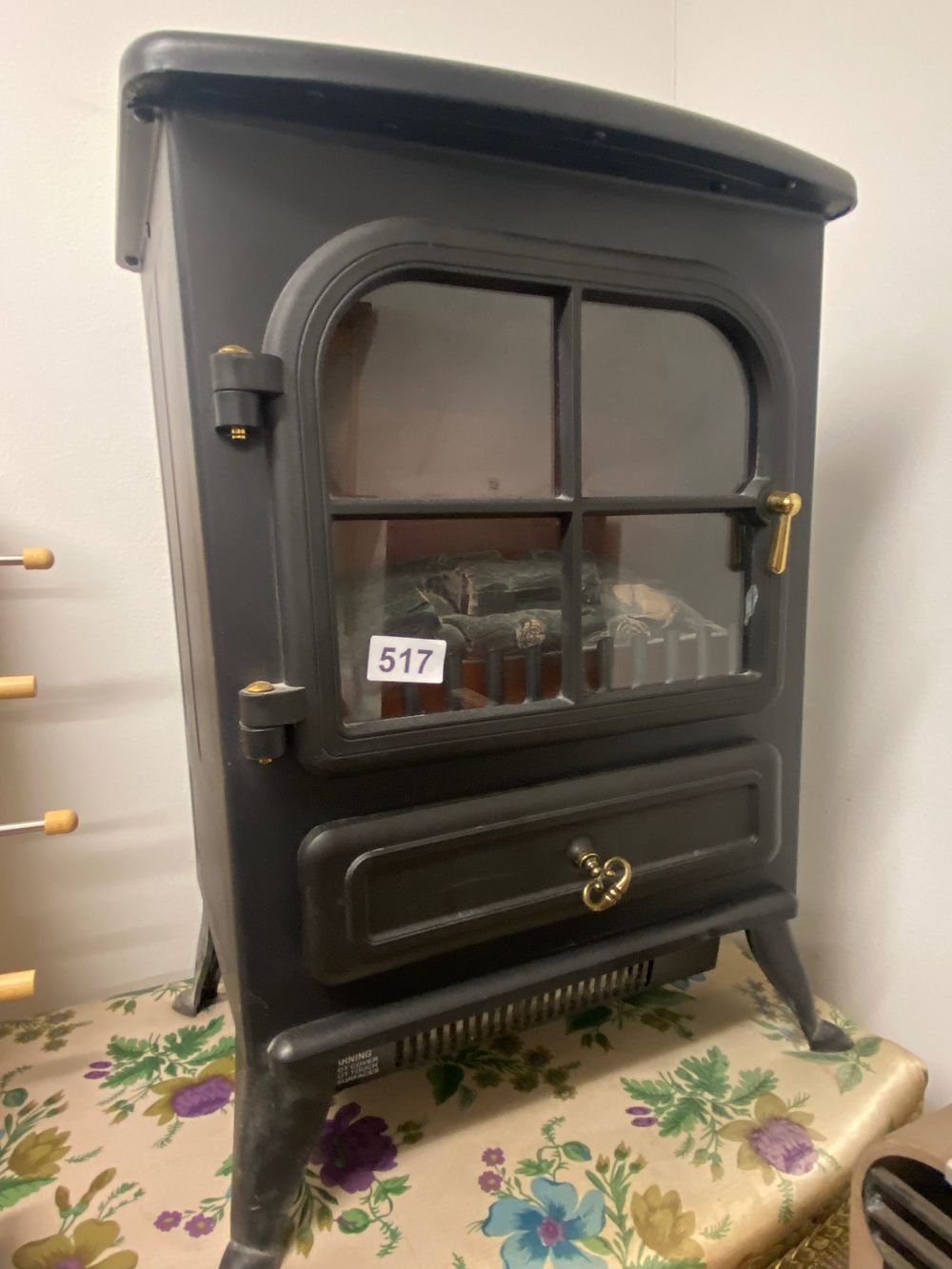 Lot 517: A Traditional Style Freestanding Electric Stove Heater