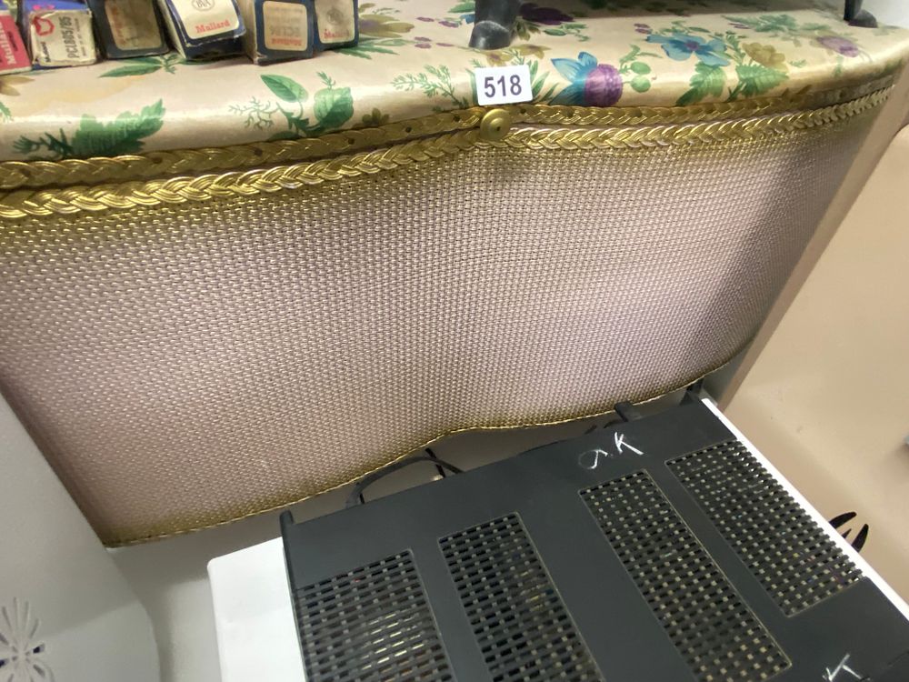 Lot 518: A vintage ottoman on legs