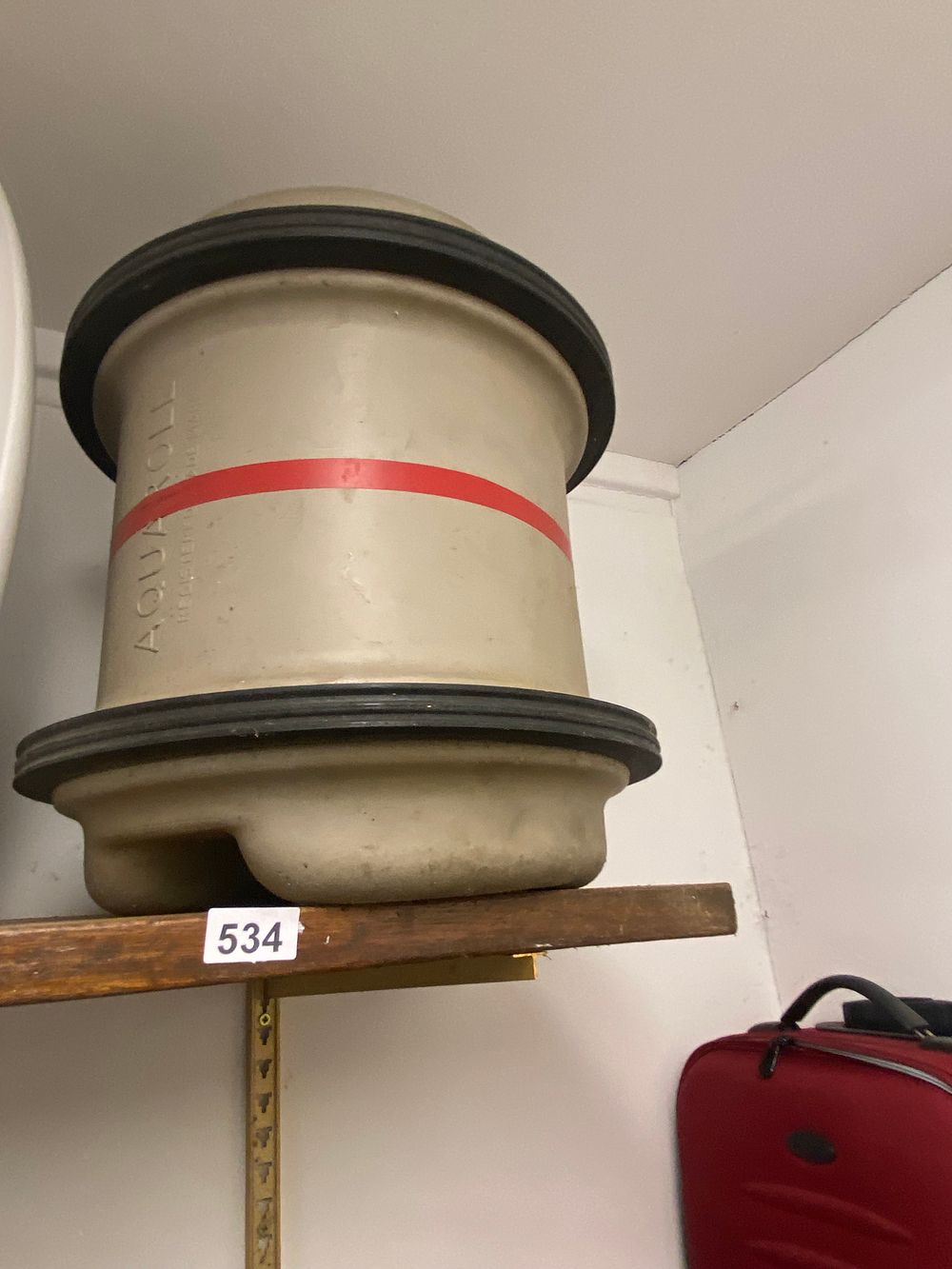 Lot 534: Aquaroll Cylindrical Plastic Container