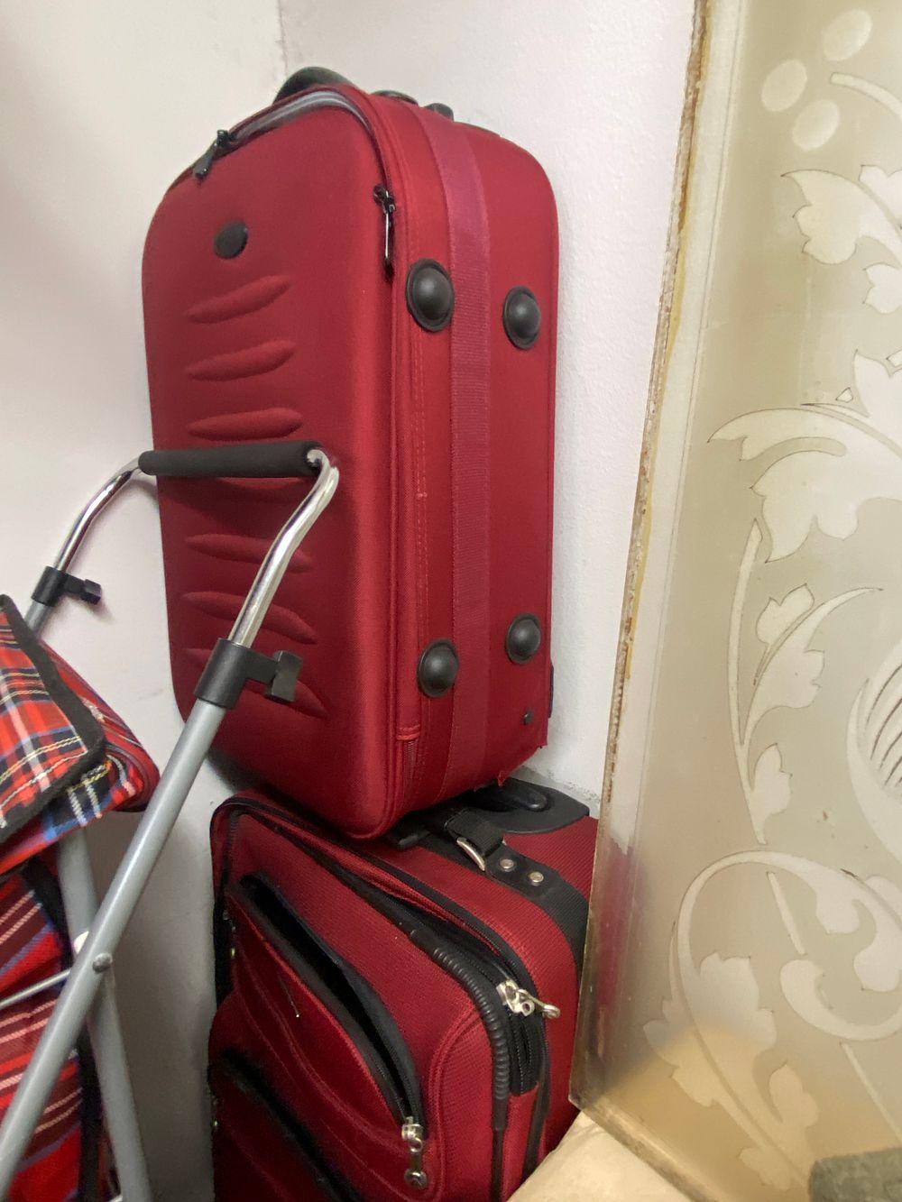 Lot 541: A Group of Modern Red Fabric Luggage and...