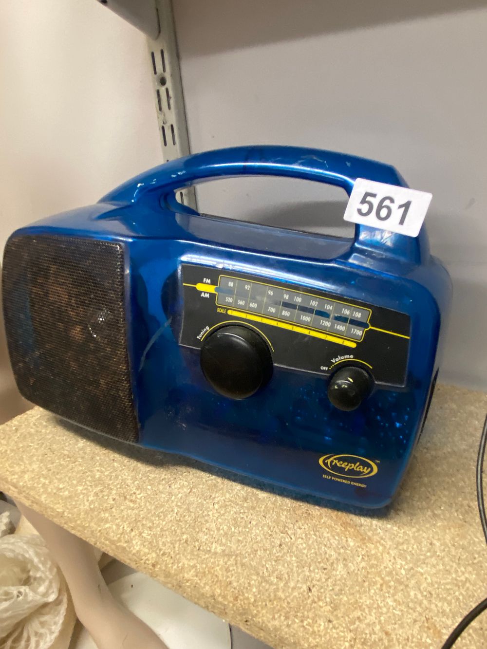Lot 561: Freeplay Self-Powered & Solar AM/FM Portable Radio, Blue...