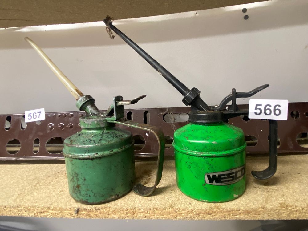 Lot 566: A Pair of Vintage Green Metal Pump Oilers,...