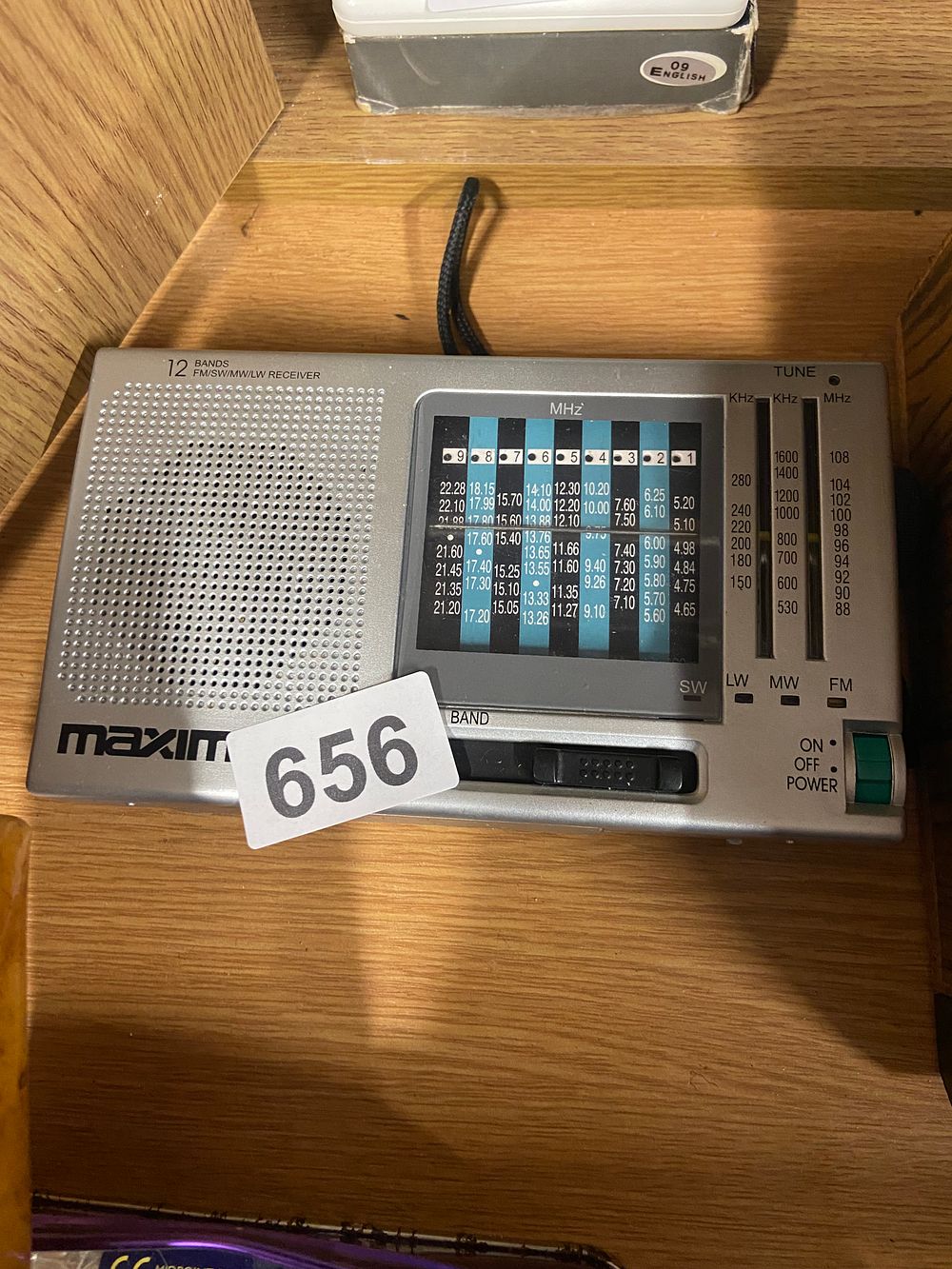 Lot 656: Modern Maxim 12-Band Multi-Frequency Portable Radio Receiver