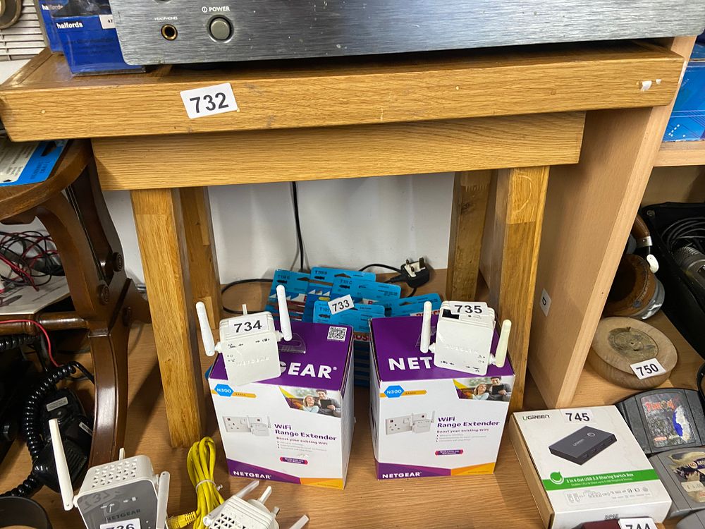 Lot 732: A Collection of NETGEAR N300 WiFi Range Extenders,...